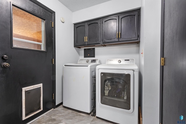 1120 Blaine St, Larchwood, IA 51241 - laundry area with washer and dryer and cabinet space