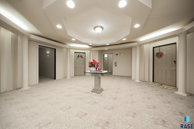 basement featuring light colored carpet and recessed lighting