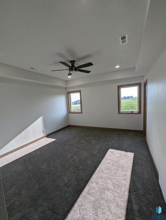 2604 S Galena Ave, Sioux Falls, SD 57110 - empty room with dark colored carpet, a ceiling fan, baseboards, and recessed lighting