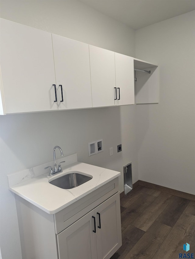 2604 S Galena Ave, Sioux Falls, SD 57110 - clothes washing area with hookup for an electric dryer, washer hookup, cabinet space, and dark wood-style flooring