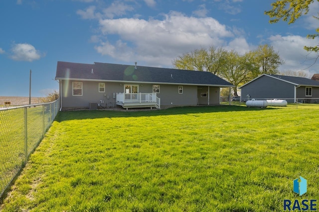 back of property featuring a wooden deck and cooling unit