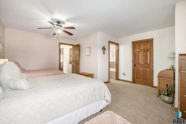 6014 Marrs Beach Ln, Madison, SD 57042 - bedroom featuring light carpet, baseboards, ceiling fan, and ensuite bathroom