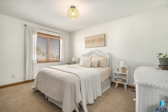 6014 Marrs Beach Ln, Madison, SD 57042 - bedroom featuring light colored carpet and baseboards