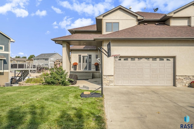 6014 Marrs Beach Ln, Madison, SD 57042 - traditional-style home with stucco siding, concrete driveway, stone siding, a front lawn, and a shingled roof