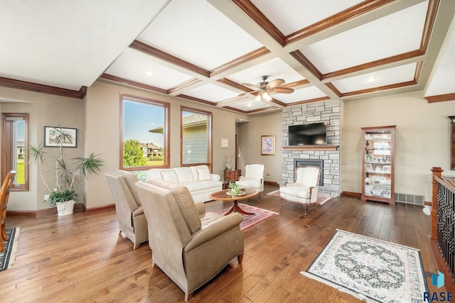 2708 W Bitterroot St, Sioux Falls, SD 57108 - living room featuring a fireplace, ceiling fan, baseboards, hardwood / wood-style flooring, and beamed ceiling