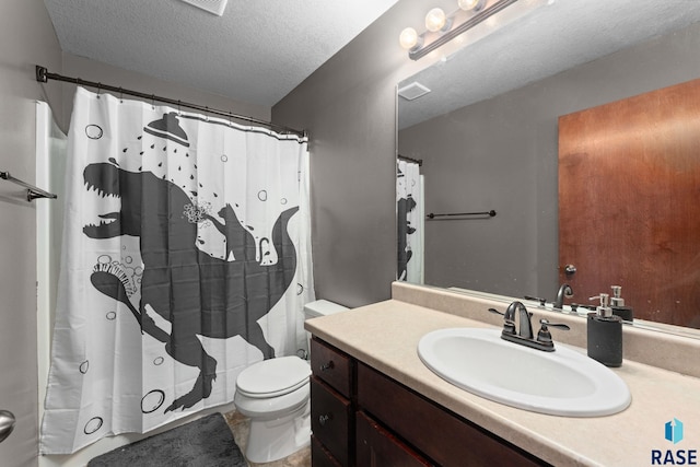 925 E Steep St, Tea, SD 57064 - full bath with toilet, vanity, and a textured ceiling