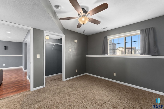 925 E Steep St, Tea, SD 57064 - unfurnished bedroom featuring carpet, baseboards, a closet, and a ceiling fan