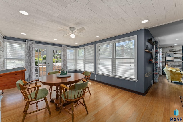 dining space featuring wooden ceiling, ceiling fan, plenty of natural light, french doors, and light wood-style flooring
