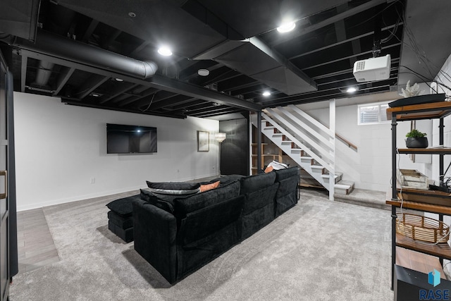 living room with stairway, wood finished floors, and baseboards