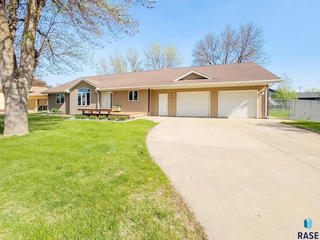 110 W Apple St, Tea, SD 57064 - single story home featuring a garage, driveway, and roof with shingles