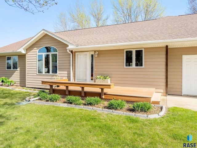 110 W Apple St, Tea, SD 57064 - view of front of property with a front yard and a shingled roof