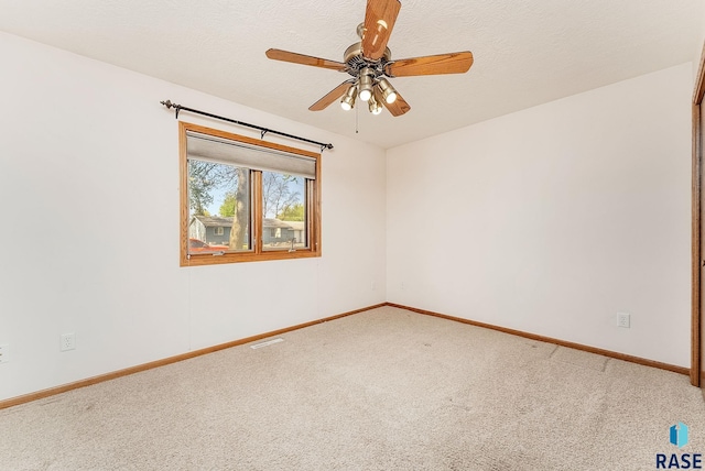 110 W Apple St, Tea, SD 57064 - carpeted spare room with baseboards and ceiling fan
