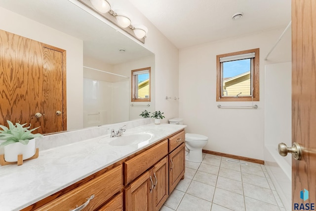 110 W Apple St, Tea, SD 57064 - full bathroom featuring plenty of natural light, baseboards, vanity, and toilet