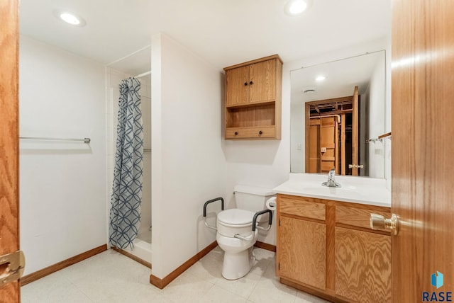 110 W Apple St, Tea, SD 57064 - full bathroom featuring baseboards, a stall shower, toilet, vanity, and recessed lighting