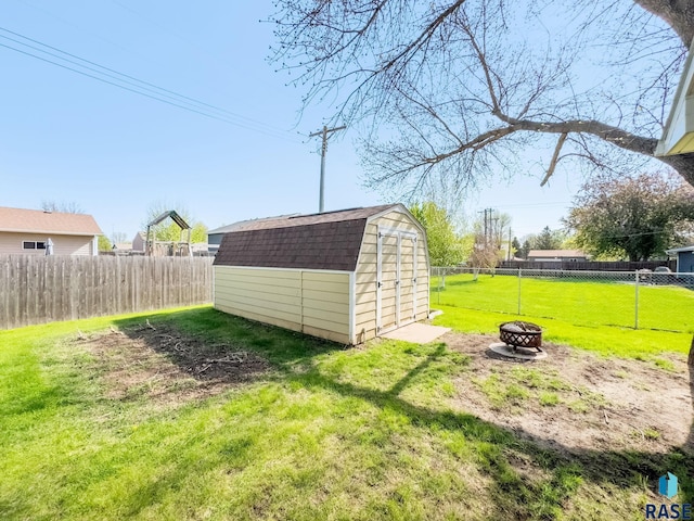 110 W Apple St, Tea, SD 57064 - view of shed with a fire pit