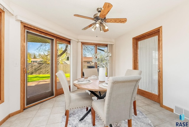 110 W Apple St, Tea, SD 57064 - dining area featuring baseboards, light tile patterned floors, and ceiling fan