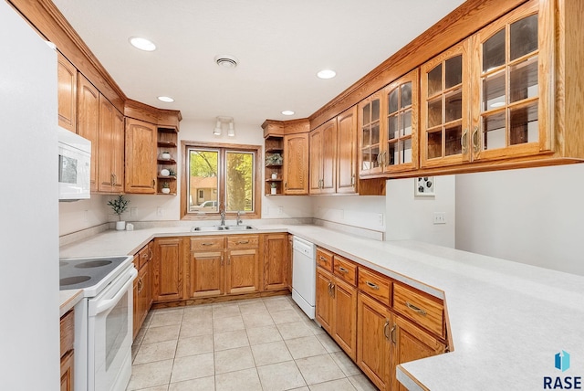110 W Apple St, Tea, SD 57064 - kitchen featuring white appliances, open shelves, a sink, light countertops, and recessed lighting