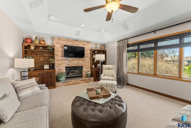 904 W Chicory Ln, Sioux Falls, SD 57108 - living room featuring a raised ceiling, light colored carpet, healthy amount of natural light, and baseboards