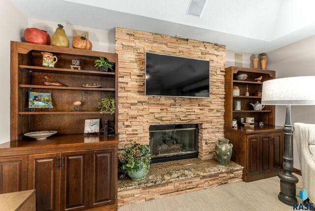 904 W Chicory Ln, Sioux Falls, SD 57108 - living area with wood finished floors and a stone fireplace