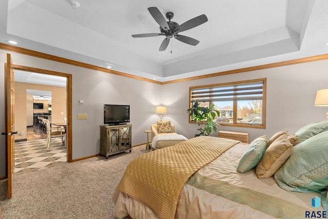904 W Chicory Ln, Sioux Falls, SD 57108 - bedroom featuring a tray ceiling, ornamental molding, carpet flooring, baseboards, and a ceiling fan