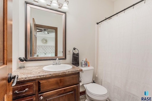 615 Marsha Cir, Tea, SD 57064 - full bath with vanity, toilet, curtained shower, and ceiling fan