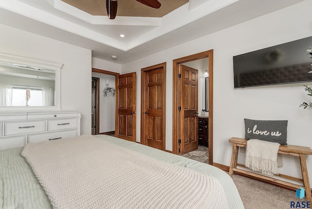 615 Marsha Cir, Tea, SD 57064 - carpeted bedroom with ensuite bathroom, ceiling fan, and baseboards