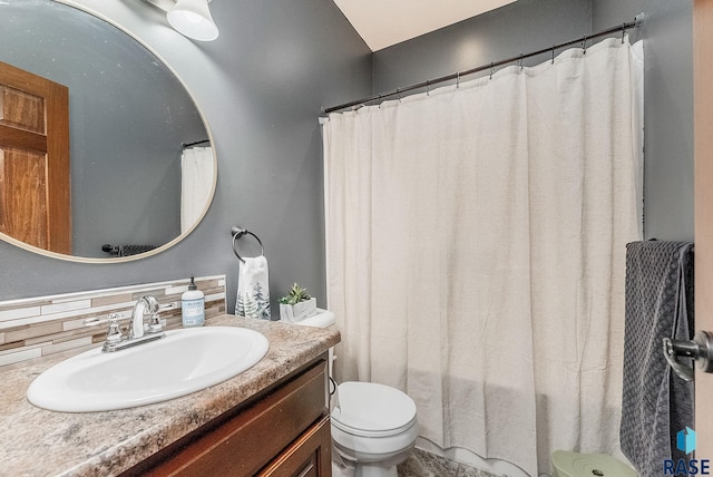 615 Marsha Cir, Tea, SD 57064 - full bath featuring toilet, vanity, tasteful backsplash, and shower / bath combo with shower curtain