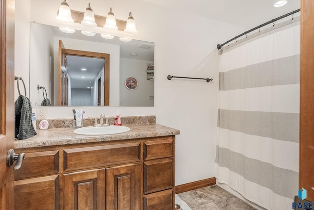615 Marsha Cir, Tea, SD 57064 - bathroom with vanity, curtained shower, and baseboards