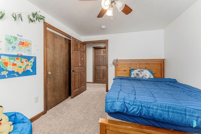 615 Marsha Cir, Tea, SD 57064 - bedroom with light colored carpet, a ceiling fan, and baseboards