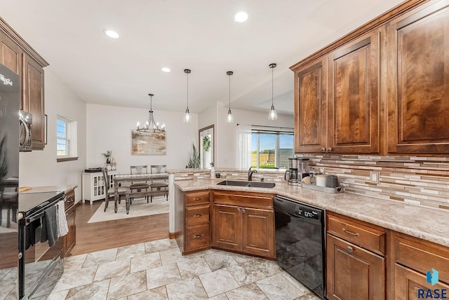 615 Marsha Cir, Tea, SD 57064 - kitchen with black appliances, a sink, healthy amount of natural light, decorative backsplash, and recessed lighting
