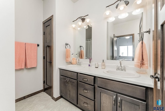 full bathroom featuring double vanity