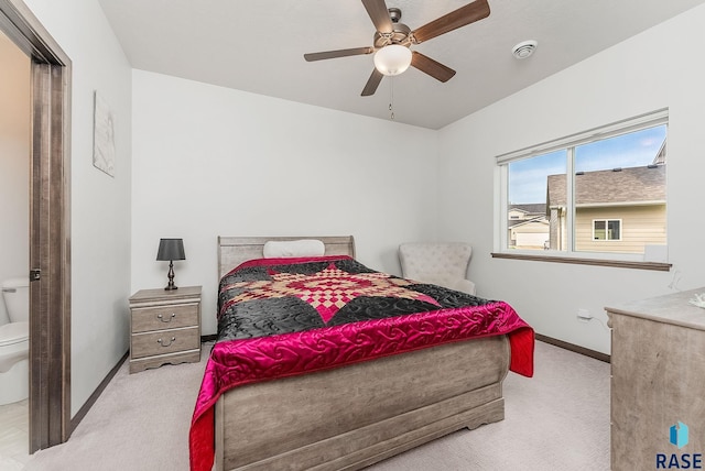 bedroom with carpet, baseboards, and a ceiling fan