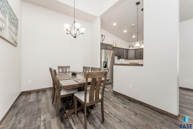 dining room featuring a chandelier, baseboards, wood finished floors, high vaulted ceiling, and recessed lighting