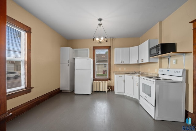 1420 W 10th St, Sioux Falls, SD 57104 - kitchen with white appliances, radiator, white cabinets, dark wood-style floors, and baseboards