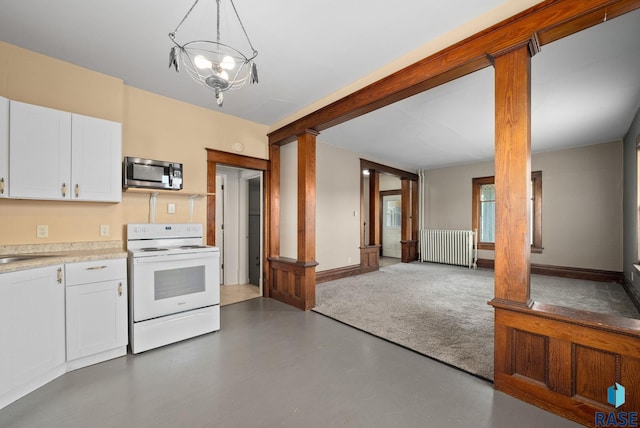 1420 W 10th St, Sioux Falls, SD 57104 - kitchen featuring white electric stove, stainless steel microwave, radiator, light countertops, and white cabinetry