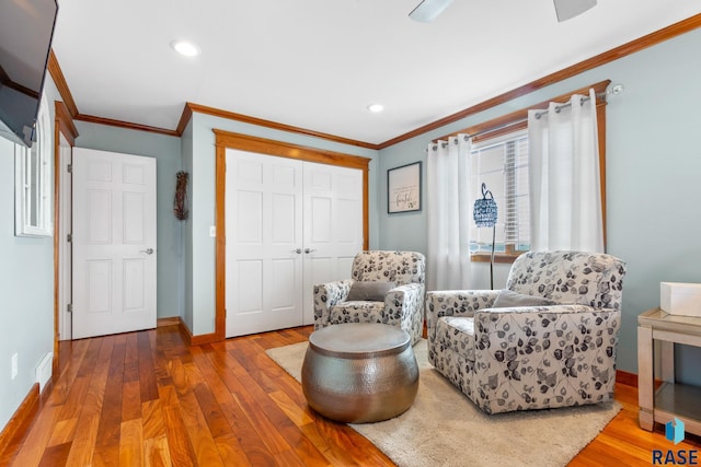 28262 472nd Ave, Worthing, SD 57077 - sitting room featuring ornamental molding, hardwood / wood-style floors, baseboards, and recessed lighting