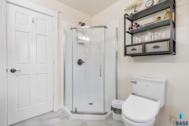 28262 472nd Ave, Worthing, SD 57077 - bathroom with marble finish flooring, a shower stall, and toilet
