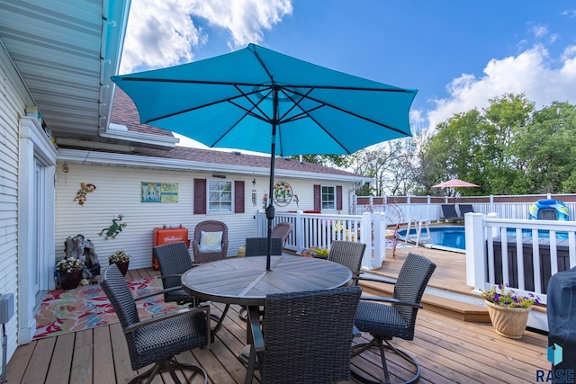 28262 472nd Ave, Worthing, SD 57077 - wooden deck featuring outdoor dining space and fence