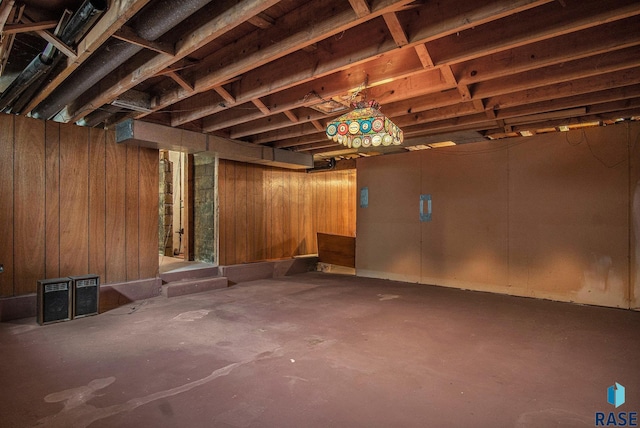 unfinished basement with wood walls
