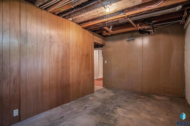 unfinished basement with wood walls