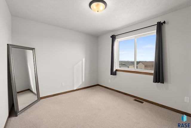 8162 E Tencate Pl, Sioux Falls, SD 57110 - unfurnished bedroom with light carpet and baseboards