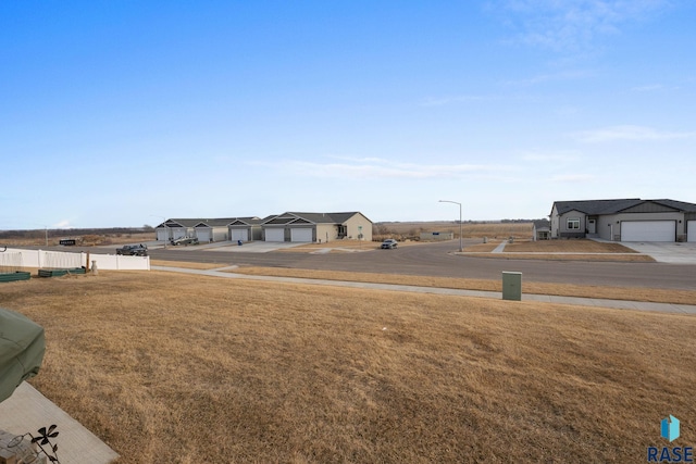8162 E Tencate Pl, Sioux Falls, SD 57110 - view of yard featuring fence