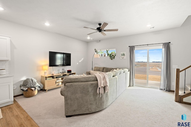 8162 E Tencate Pl, Sioux Falls, SD 57110 - living area featuring a ceiling fan, recessed lighting, light wood-style flooring, and stairs