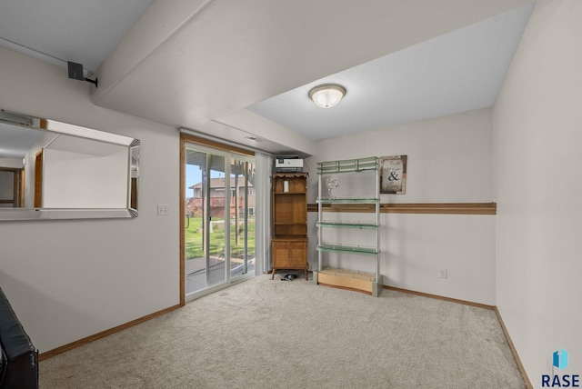 7708 W Eli Ct, Sioux Falls, SD 57106 - spare room featuring carpet floors and baseboards