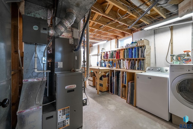 below grade area with separate washer and dryer and heating unit