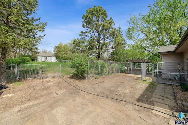view of yard featuring a gate and fence