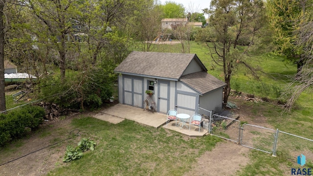 view of shed with a gate