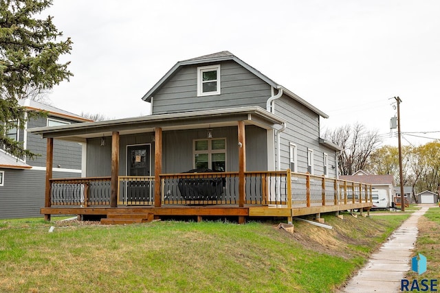 333 S Depot Ave, Garretson, SD 57030 - view of front facade with a front yard and a porch