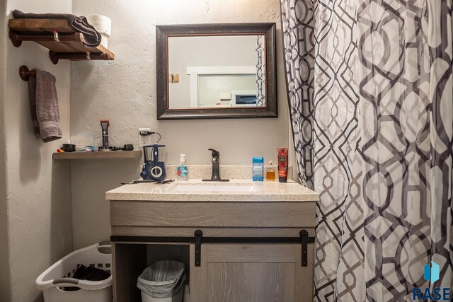 333 S Depot Ave, Garretson, SD 57030 - full bathroom featuring vanity and curtained shower