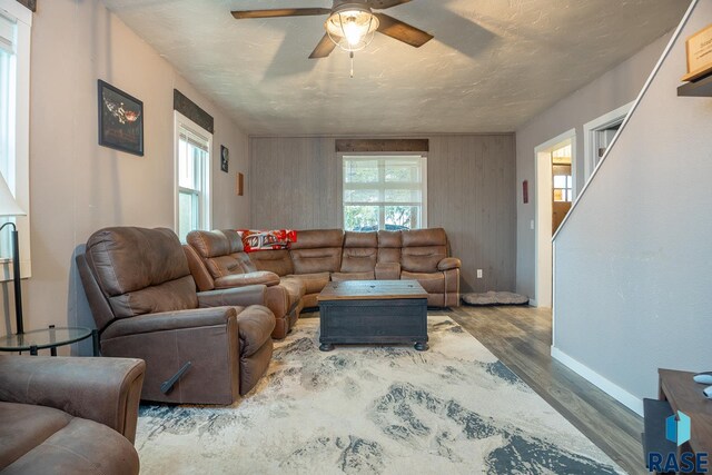 333 S Depot Ave, Garretson, SD 57030 - living area with wood finished floors, a ceiling fan, healthy amount of natural light, and baseboards